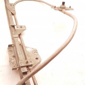 Podnośnik szyby przód L Favorit Skoda