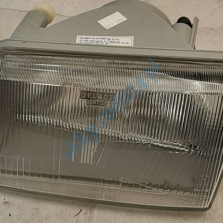 Reflektor L H4 CC Zelmot kpl.