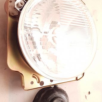 Reflektor główny Golf II H4